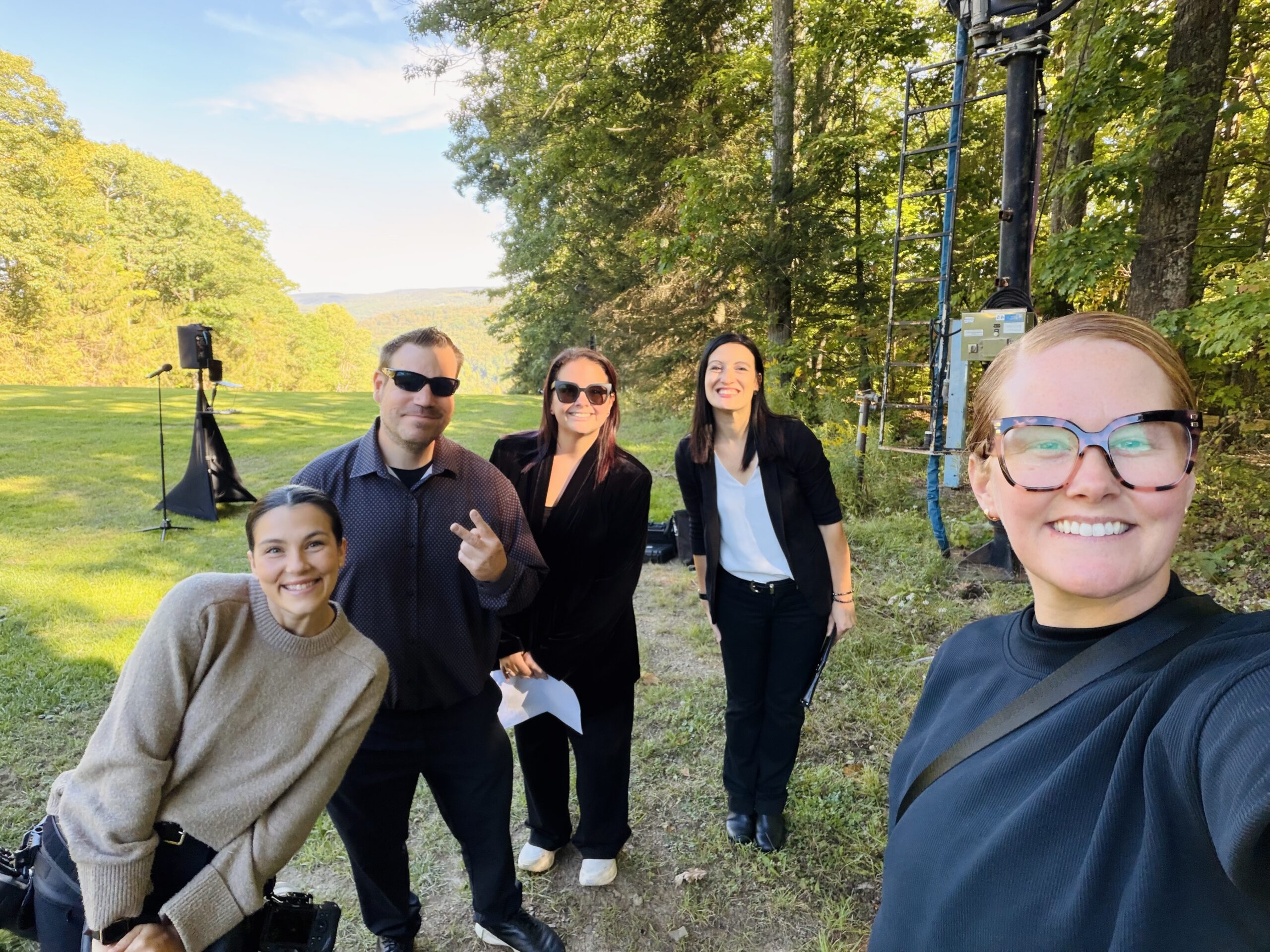 Paige Treadway and event coordination team smiling together on wedding day