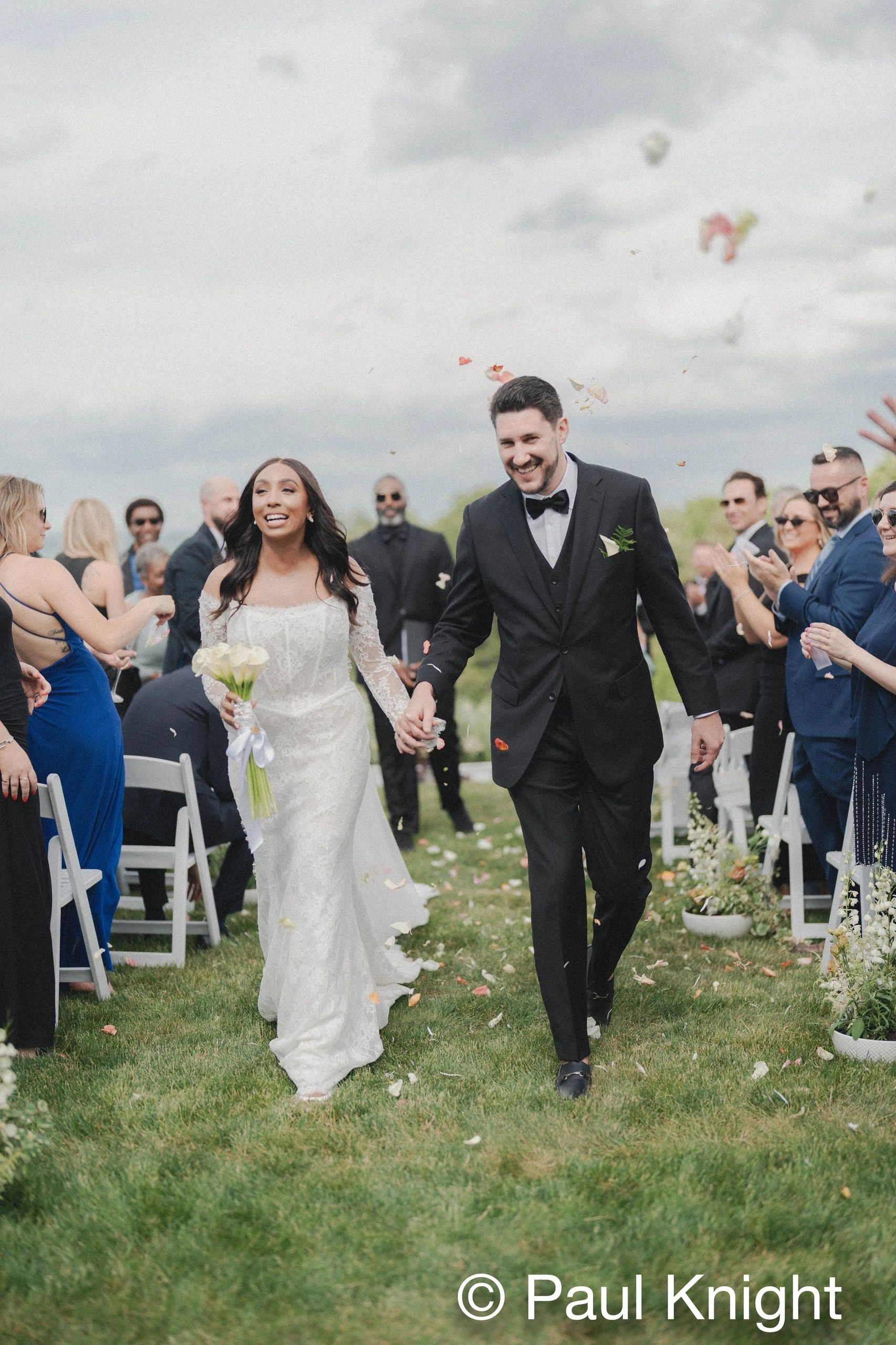Sophia and Steve ceremony recessional celebration photographed by Paul Knight