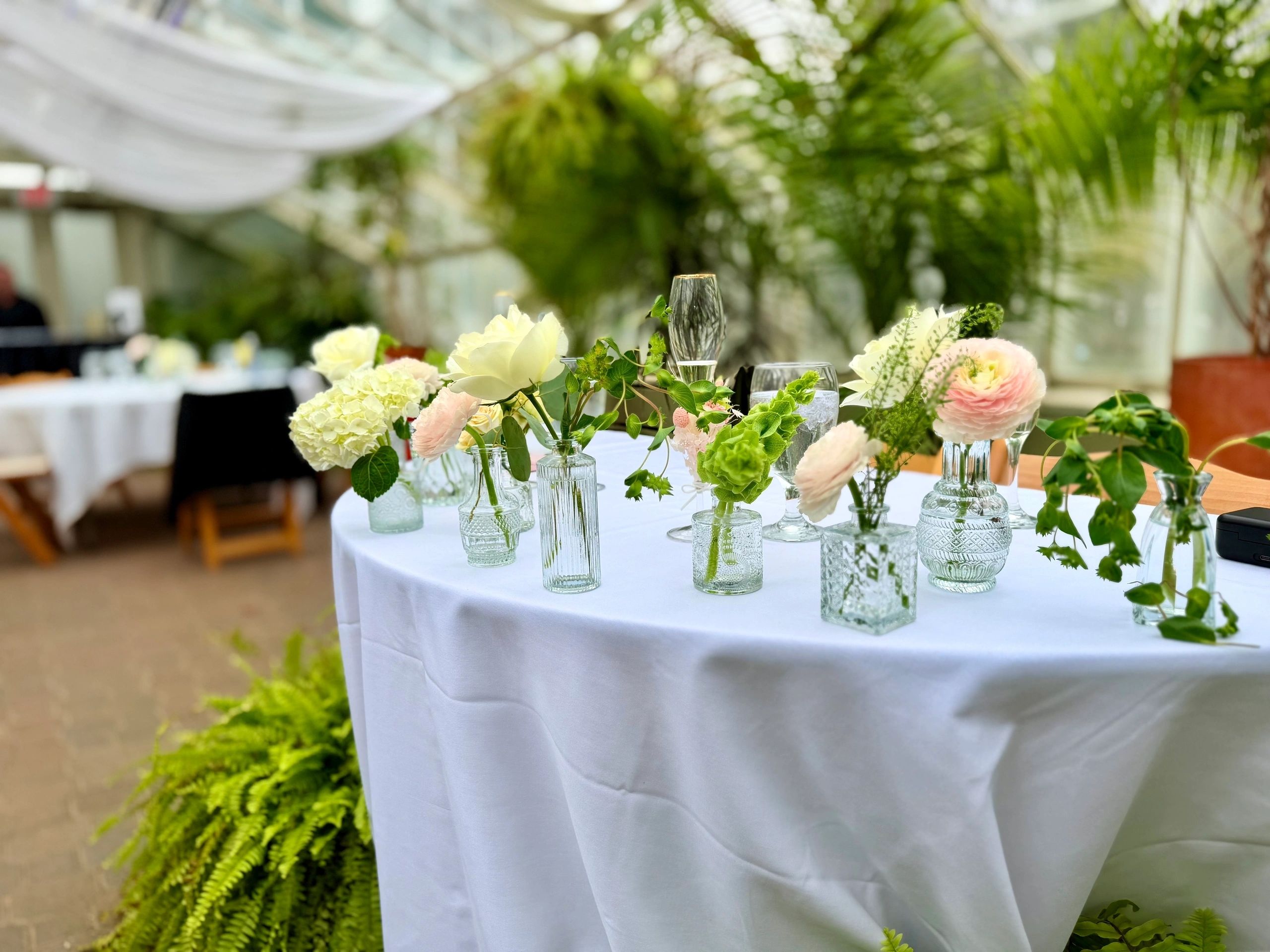 Full Service Event Planning and Coordination — Styled reception table and floral design